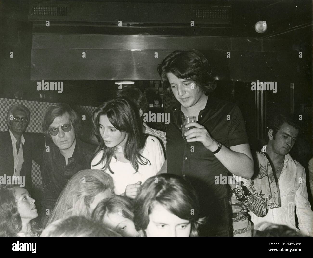Italian film actor Christian De Sica in a disco, Rome, Italy 1970s Stock Photo
