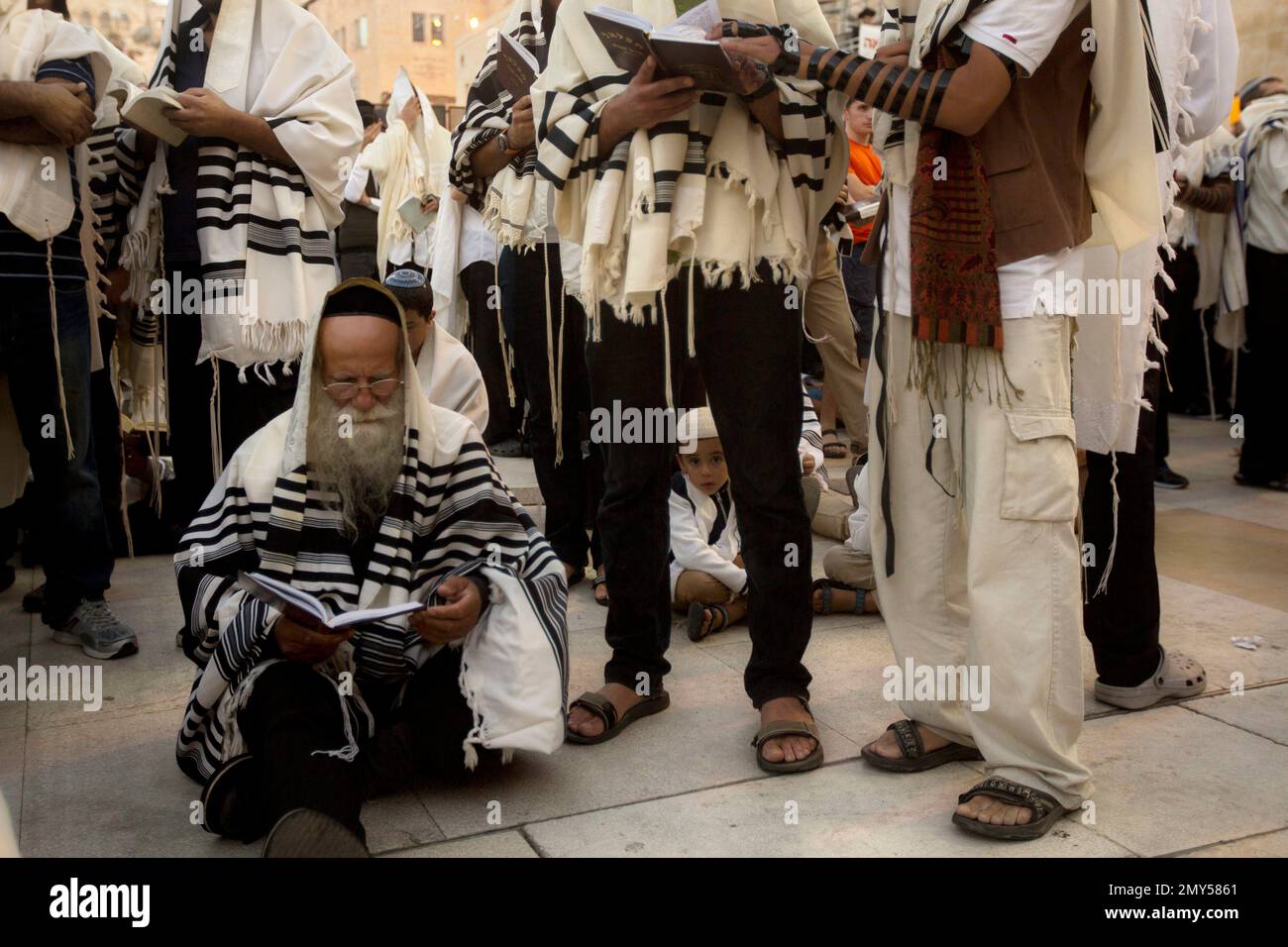 UltraOrthodox Jewish men pray during the mourning ritual of Tisha B'Av