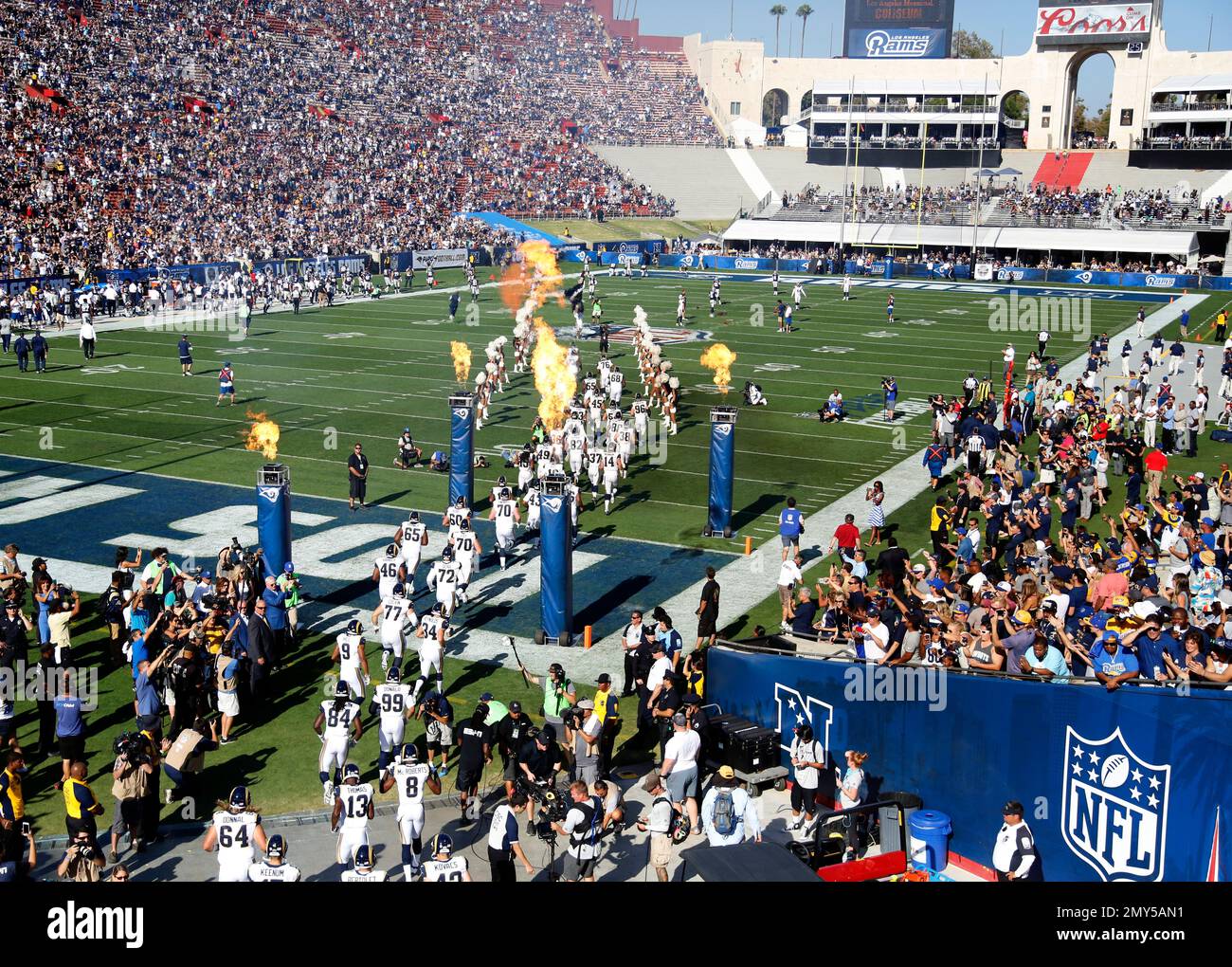 The Los Angeles Rams take the field at Los Angeles Memorial Coliseum ...