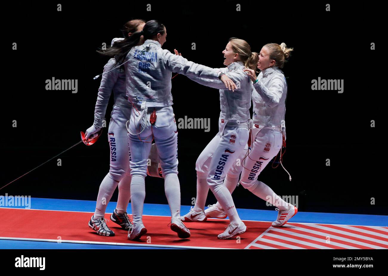 Ekaterina Dyachenko, Yana Egorian, Yuliya Gavrilova, and Sofya Velikaya of Russia celebrate