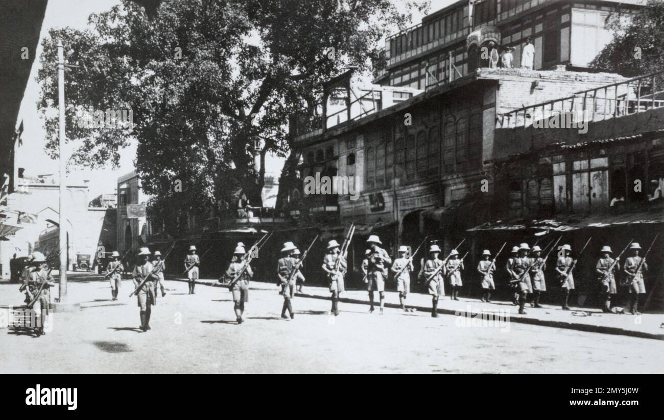 British infantry on riot patrol in Peshawar during the demonstrations against the British colonial government in India in 1930. Stock Photo