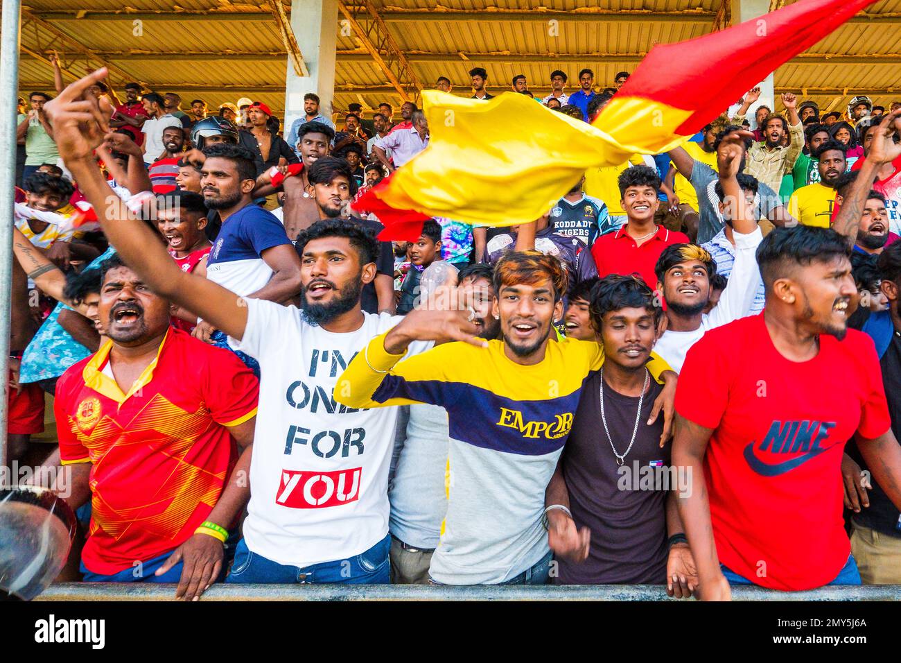Enthusiastic football supporters at a match in Jaffna, Sri Lanka Stock Photo