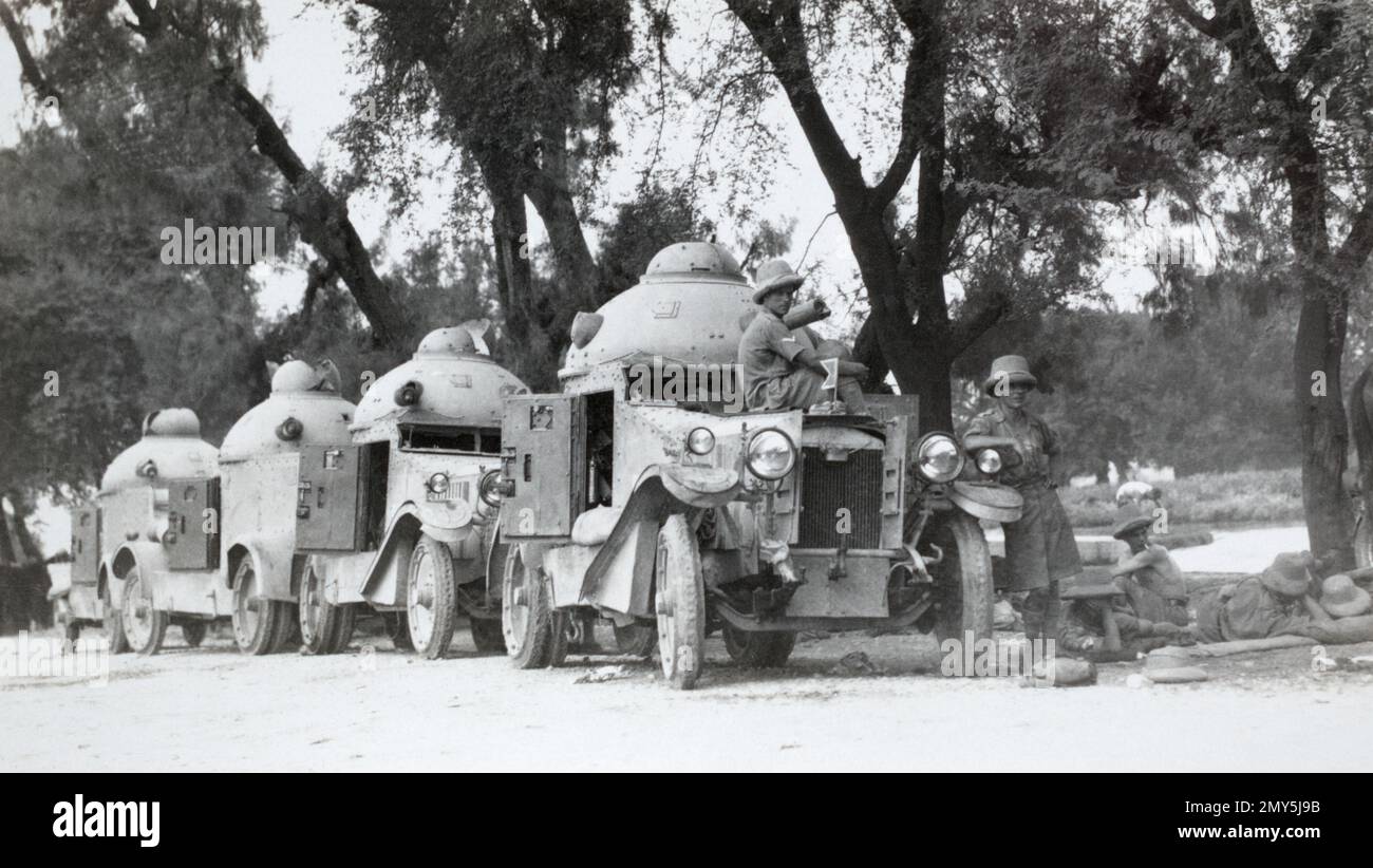 A road patrol of four Vickers Crossley armoured cars with their crew in the North West Frontier region of British India c. early 1930s. Stock Photo