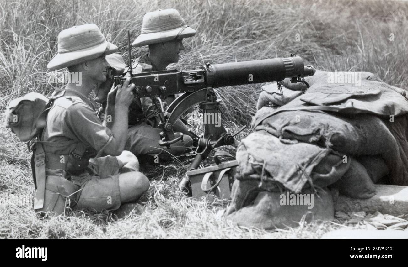 British infantry with a Vickers machine gun in the North West Frontier region of British India c. early 1930s. Stock Photo