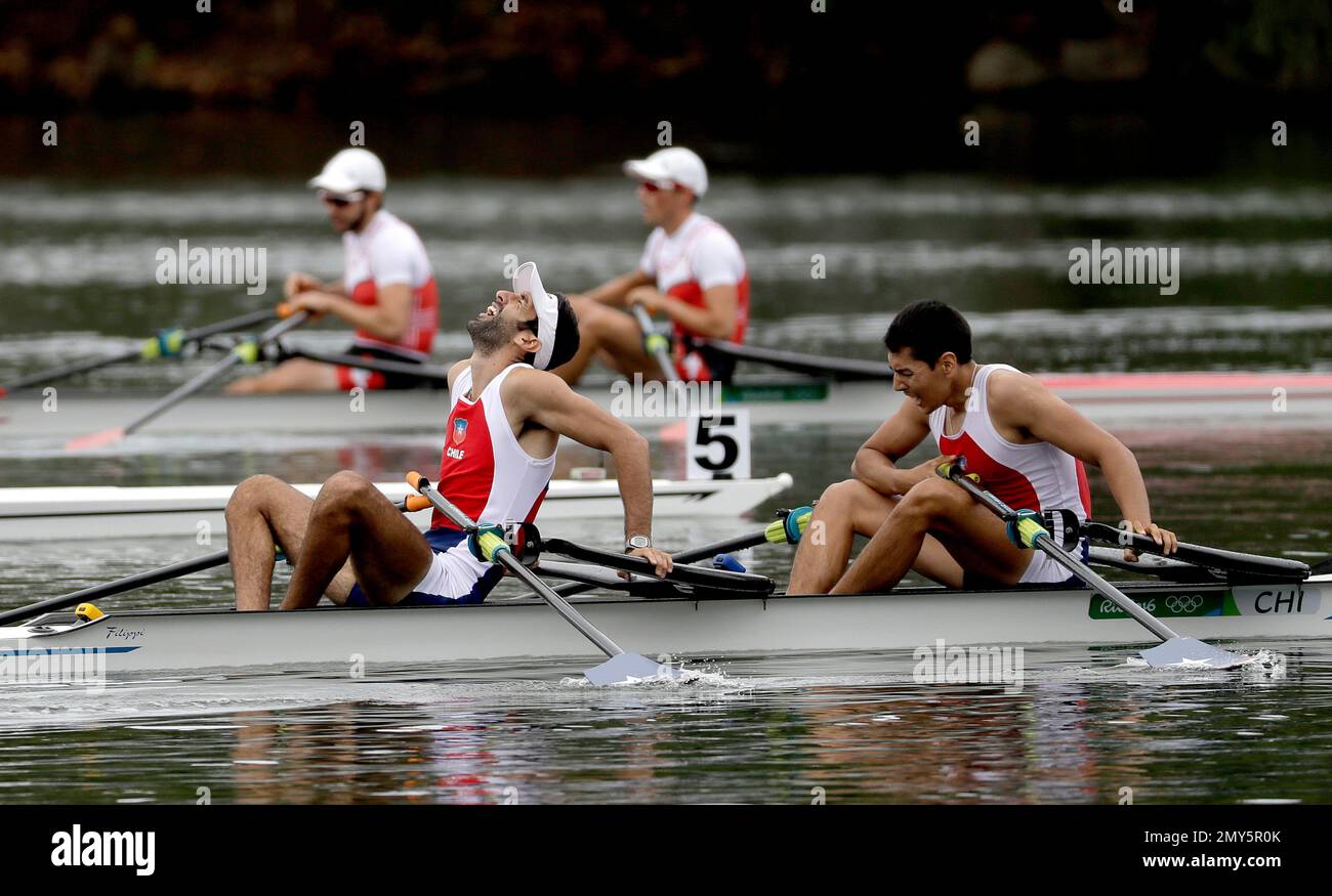 Bernardo Guerrero Diaz and Felipe Cardenas Morales, of Chile, rest