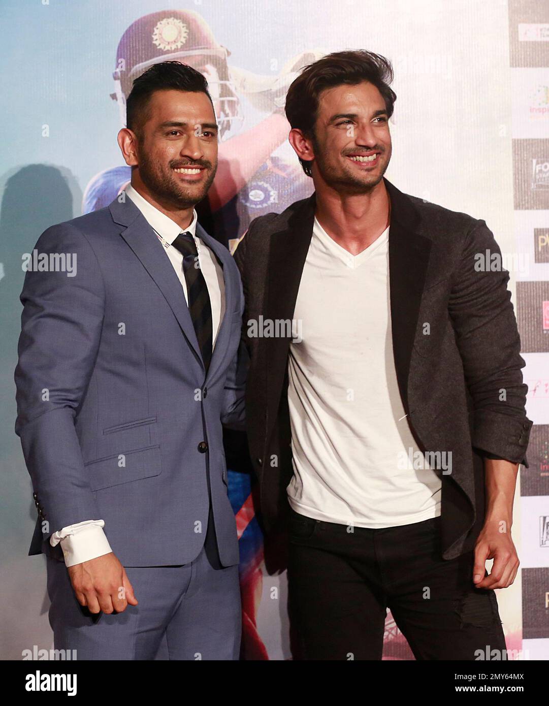 Indian cricketer Mahendra Singh Dhoni, left, and Bollywood actor Sushant  Singh Rajput pose for a picture during the trailer launch of the upcoming  movie 'MS Dhoni: The Untold Story' in Mumbai, India,