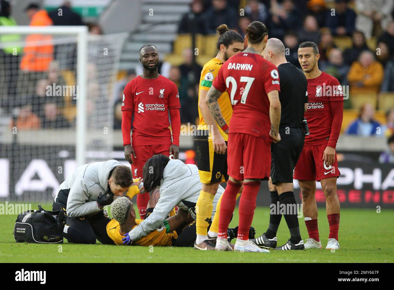 Wolverhampton, UK. 04th Feb, 2023. Mario Lemina of Wolverhampton Wanderers receives treatment on the pitch. Premier League match, Wolverhampton Wanderers v Liverpool at the Molineux Stadium in Wolverhampton, England on Saturday 4th February 2023. this image may only be used for Editorial purposes. Editorial use only, license required for commercial use. No use in betting, games or a single club/league/player publications. pic by Chris Stading/Andrew Orchard sports photography/Alamy Live news Credit: Andrew Orchard sports photography/Alamy Live News Stock Photo