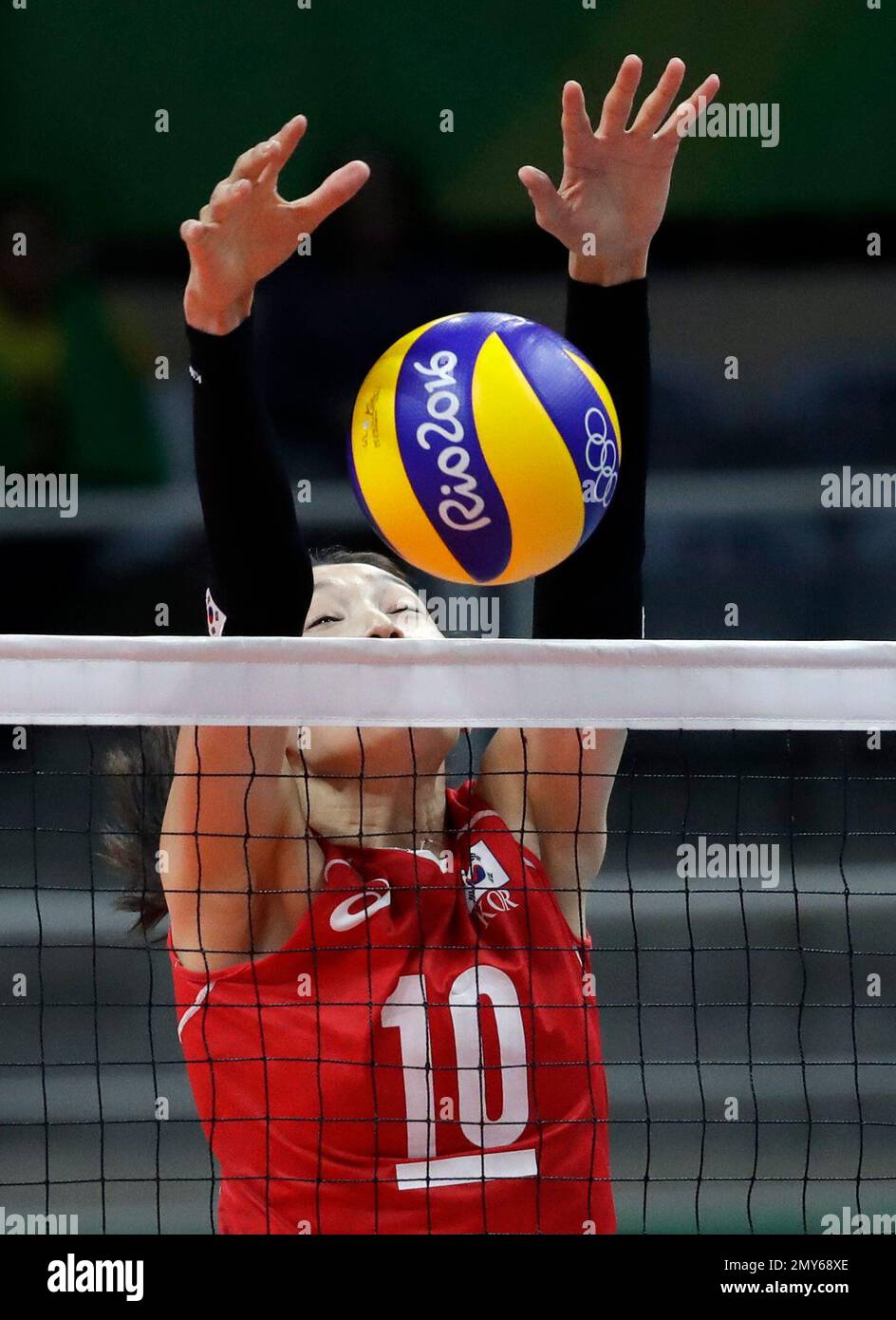 South Korea's Kim Yeonkoung blocks during a women's preliminary