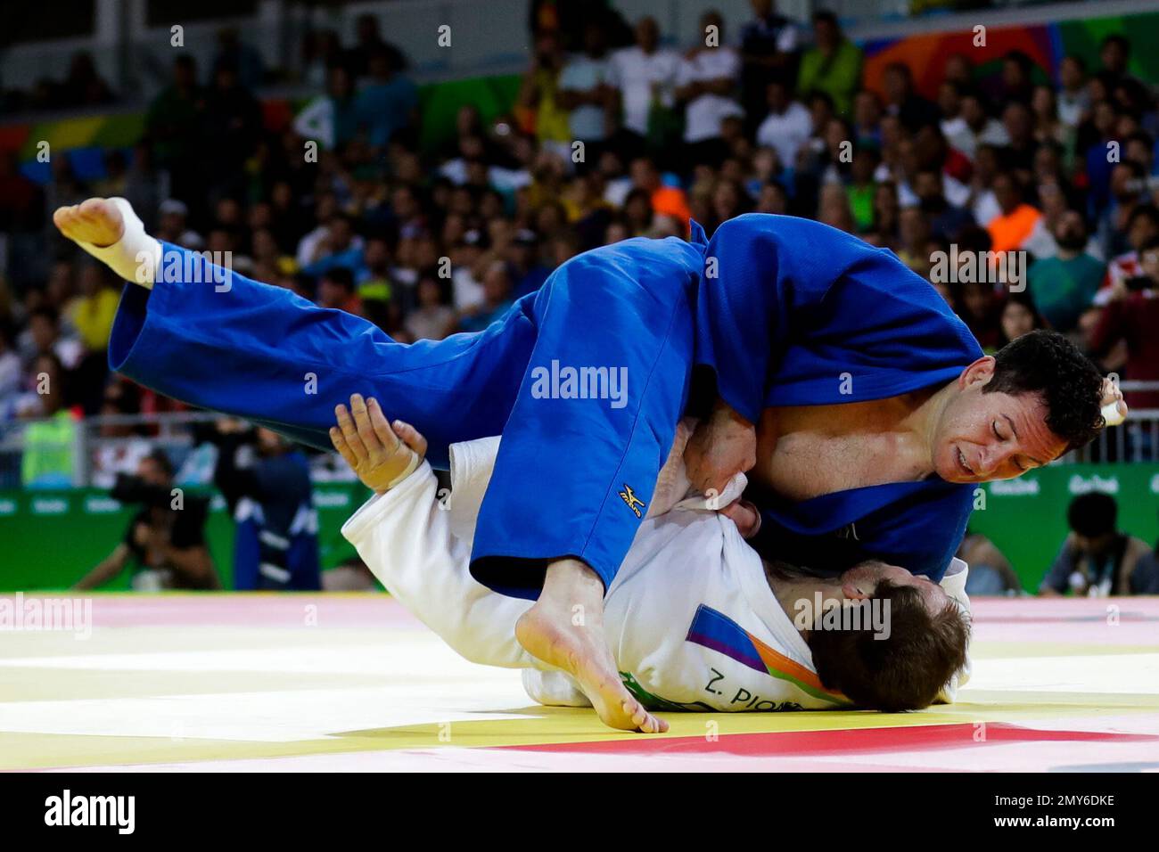 Brazil's Tiago Camilo competes against South Africa's Zack Piontek during the men's 90-kg judo competition at at the 2016 Summer Olympics in Rio de Janeiro, Brazil, Wednesday, Aug. 10, 2016. (AP Photo/Markus Schreiber) Stock Photo