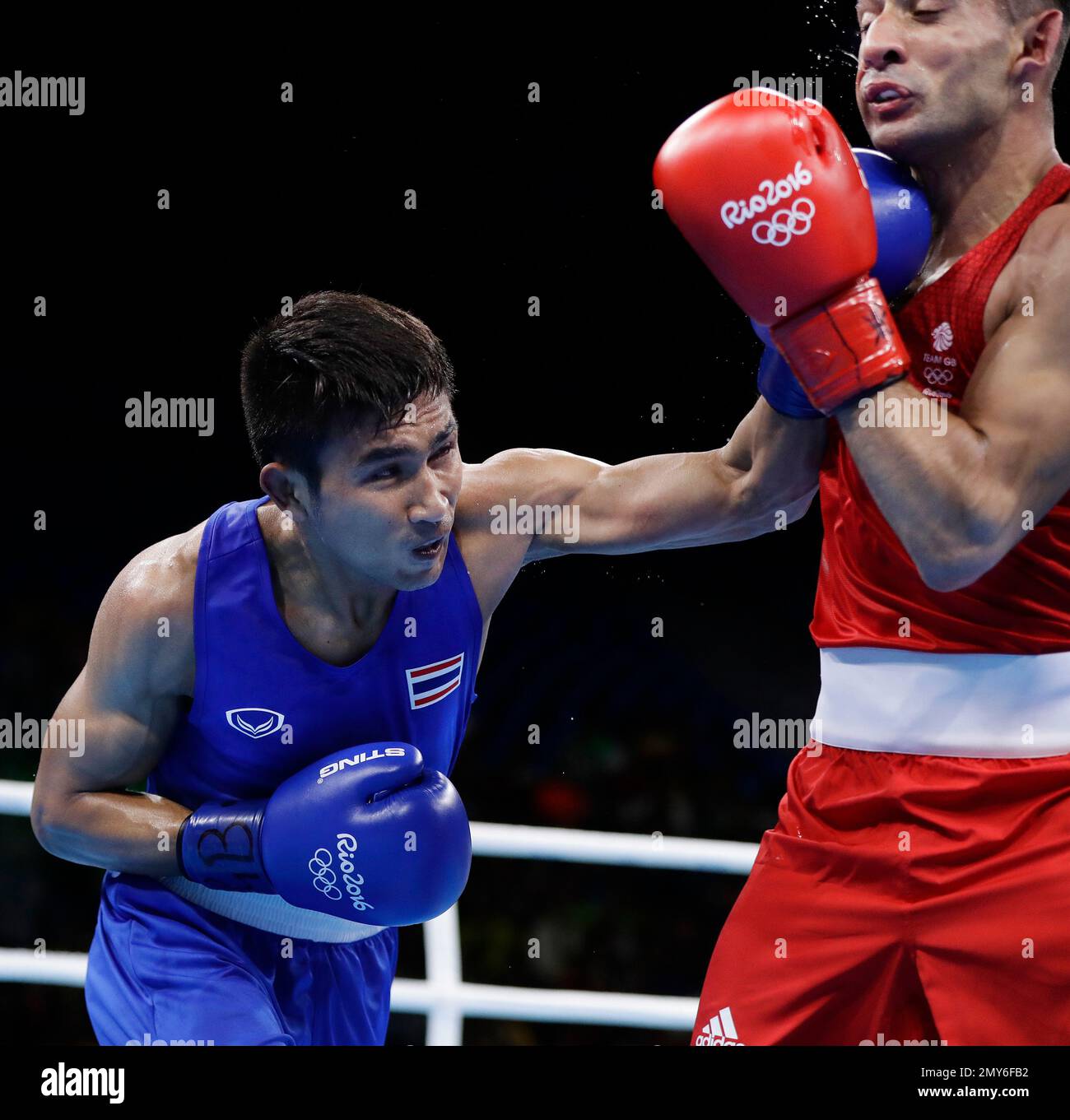 Thailand's Chatchai Butdee, left, fights Britain's Qais Ashfaq during a