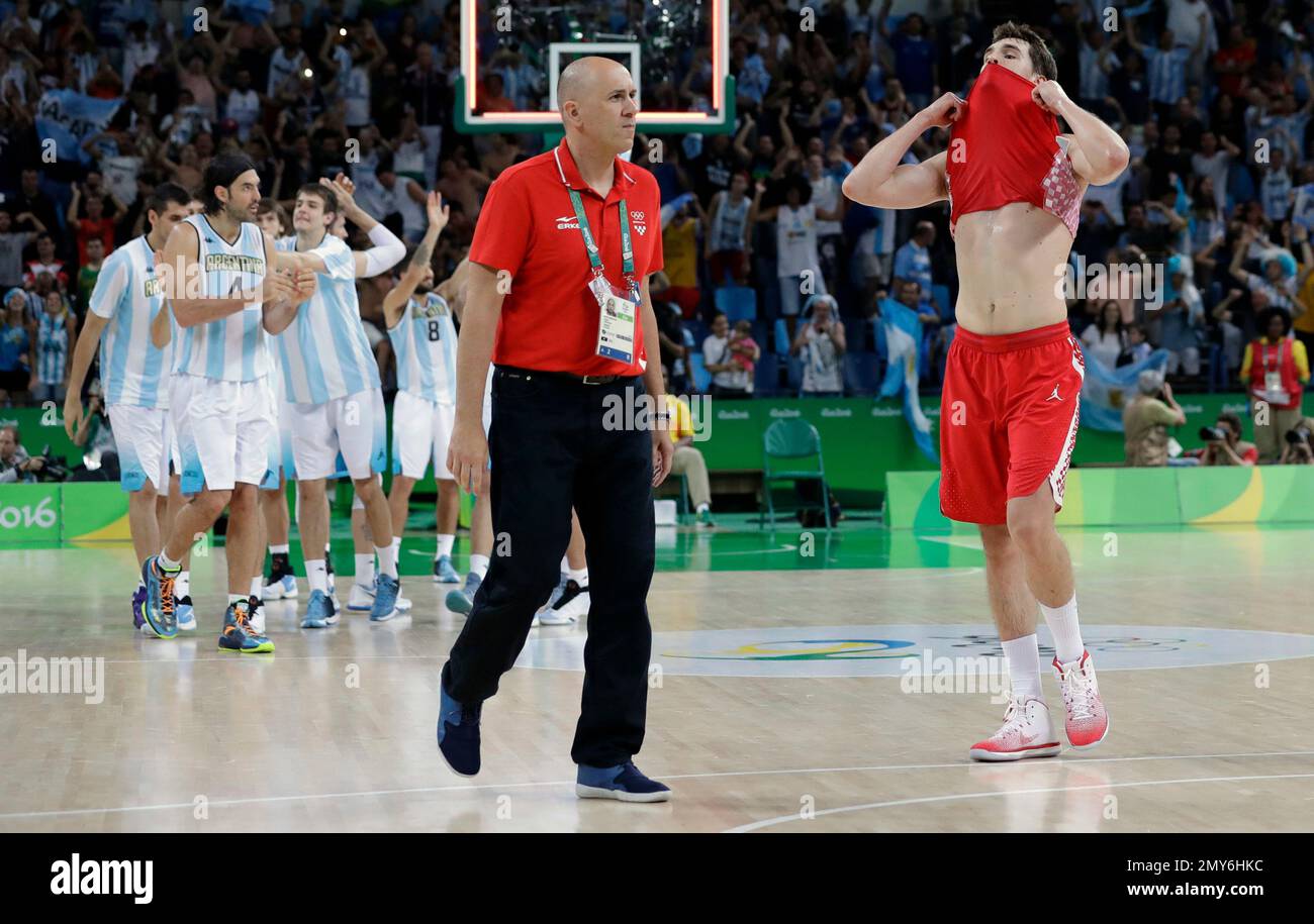 Croatia s Mario Hezonja pulls his jersey over his face following the team s loss to Argentina in a men s basketball game at the 2016 Summer Olympics in Rio de Janeiro Brazil Tuesday Aug
