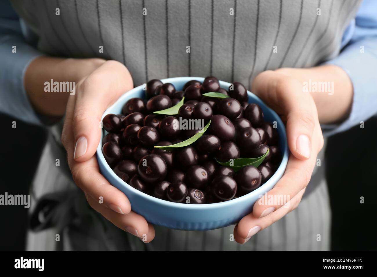 Acai berries hand hi-res stock photography and images - Alamy