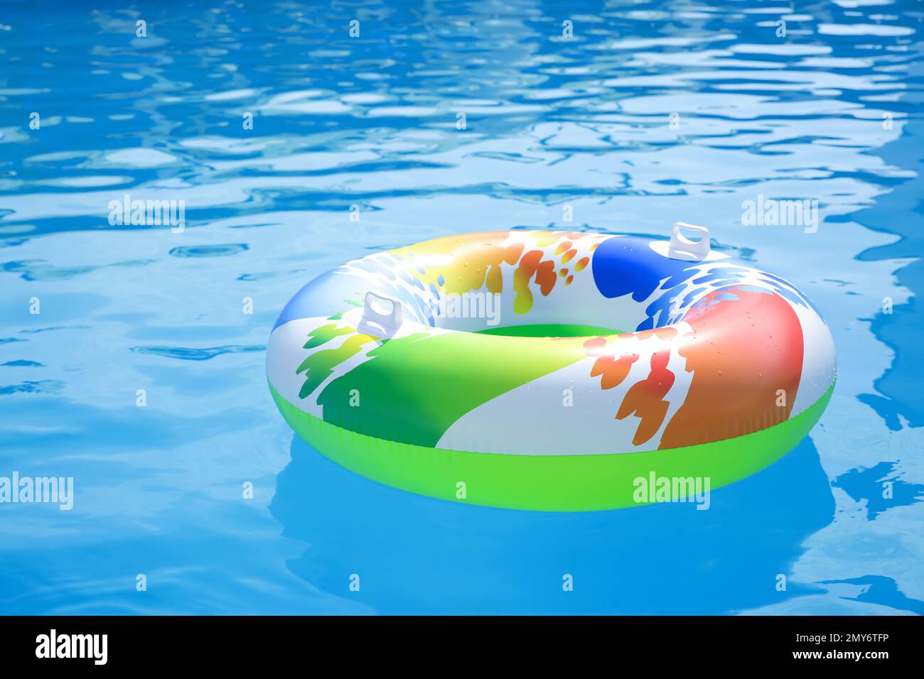 Inflatable ring in swimming pool on sunny day Stock Photo Alamy