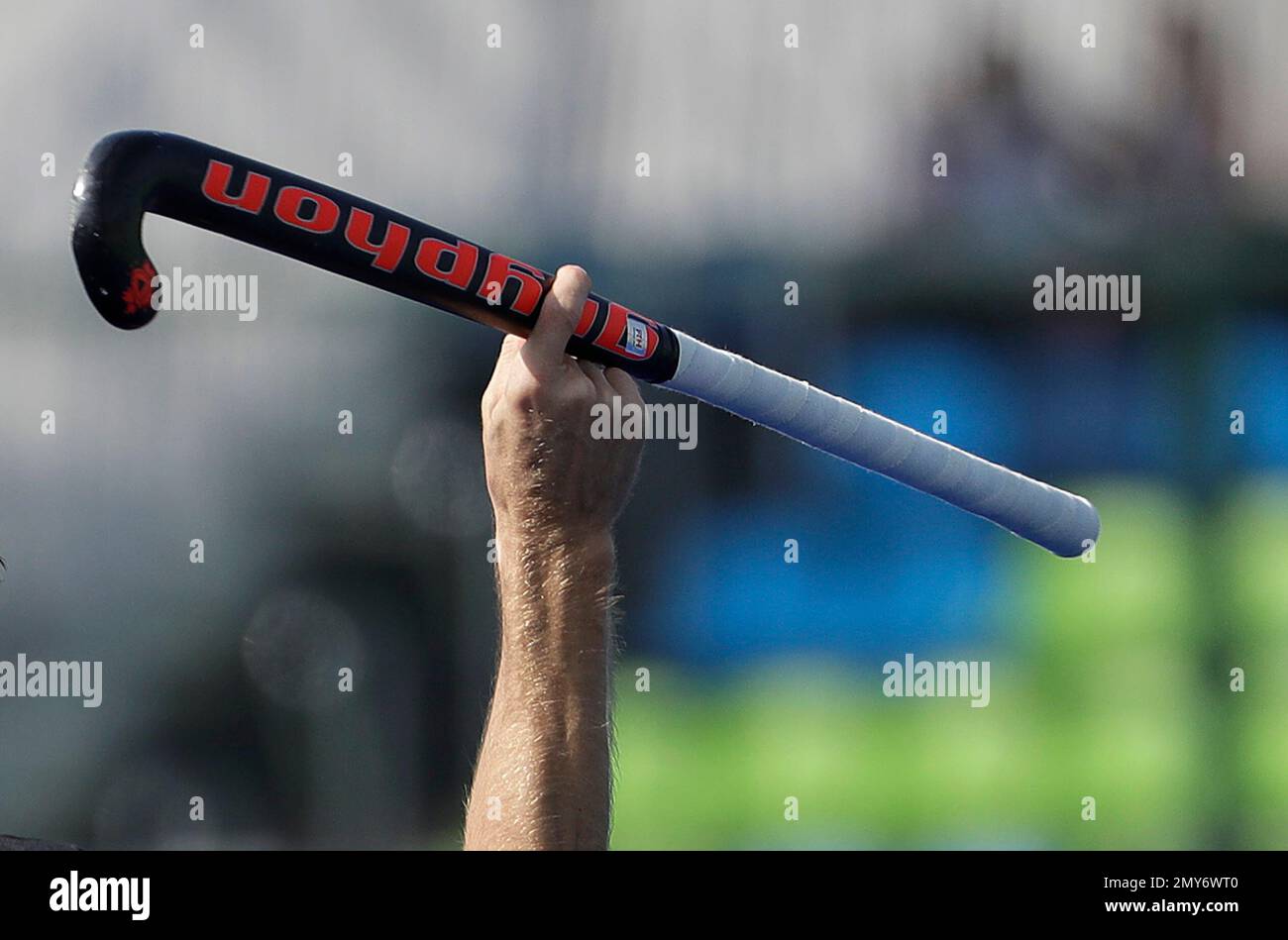 New Zealand's Simon Child, rises his hockey stick as he celebrates his against Spain during a men's field hockey match at 2016 Summer Olympics in Rio de Brazil, Tuesday, Aug.