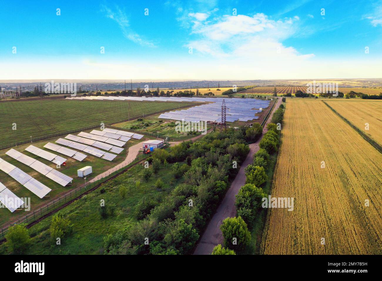 Solar panels installed outdoors, aerial view. Alternative energy source ...