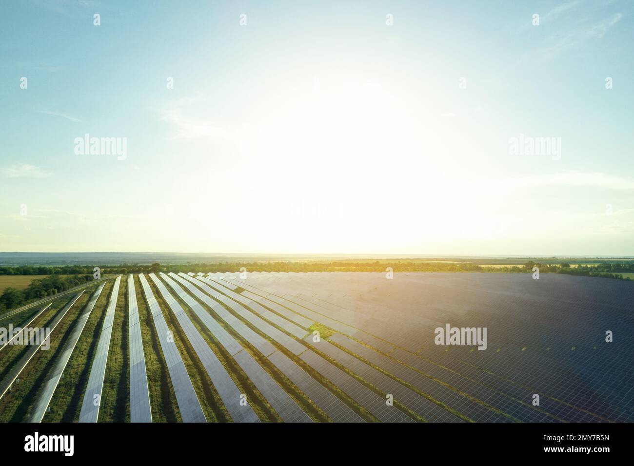 Solar panels installed outdoors, aerial view. Alternative energy source ...