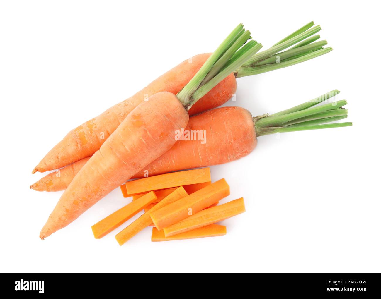 Whole and cut ripe carrots isolated on white, top view Stock Photo - Alamy