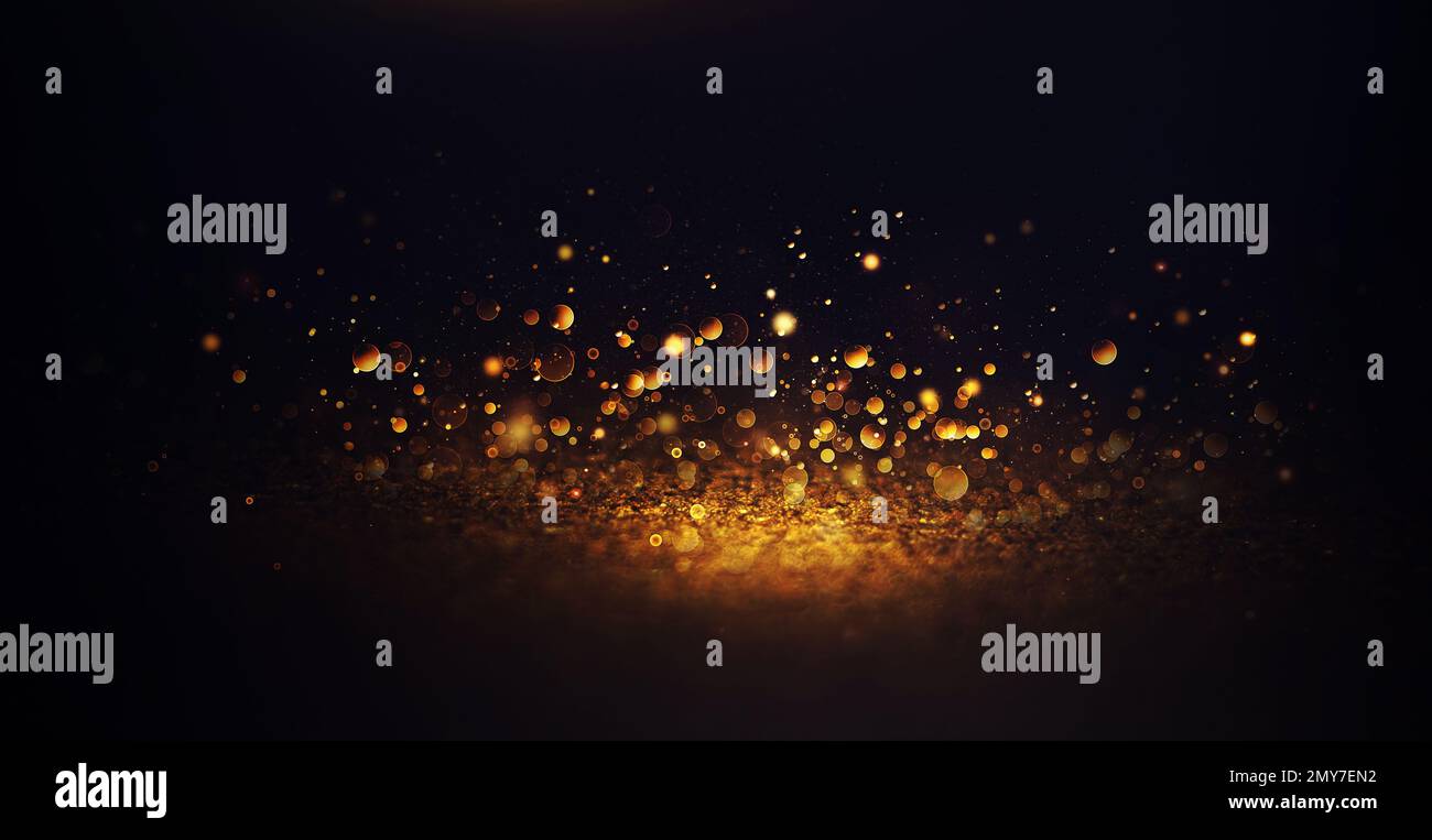 Golden glitter lights particles hi-res stock photography and images - Alamy