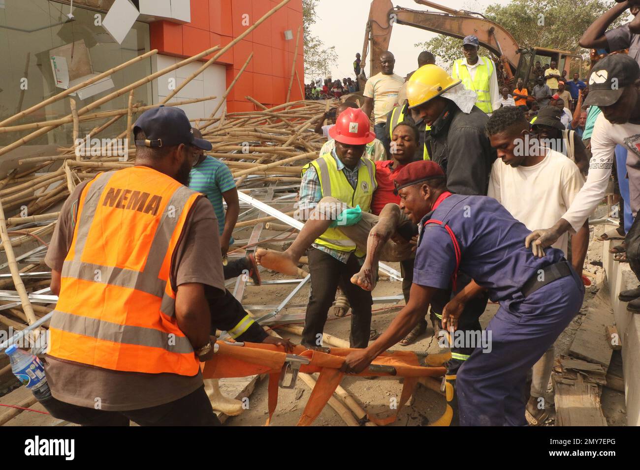 Rescue teams at the site of a 2-story building under construction that collapsed in Abuja, Nigeria’s capital city, Feb. 2, 2023. One person was confirmed dead, four persons rescued alive with serious injury and many were trapped under the rubbles after the two-story building collapsed. Nigeria. Stock Photo