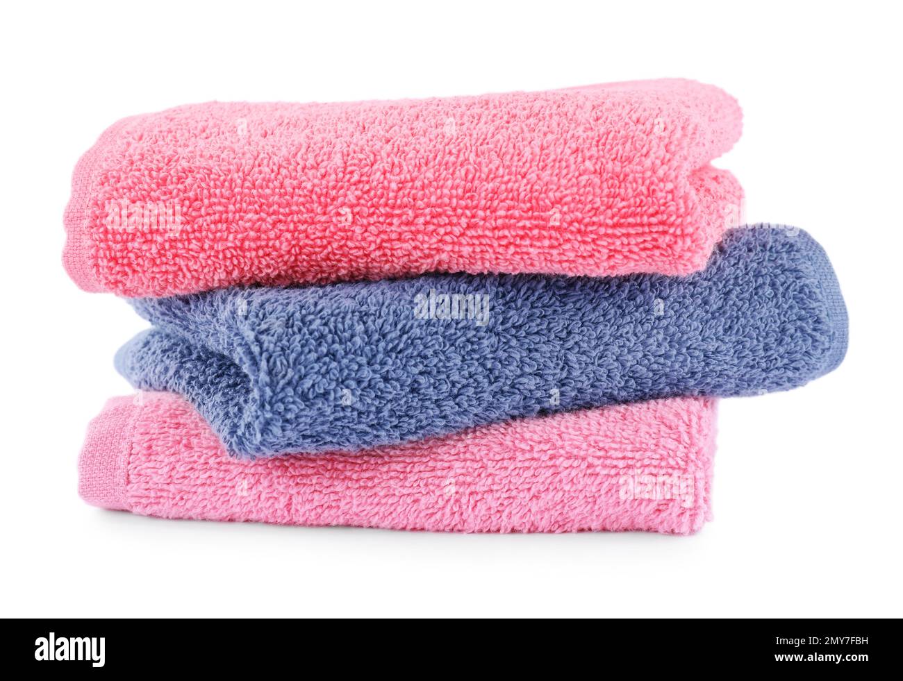 Folded soft terry towels isolated on white Stock Photo