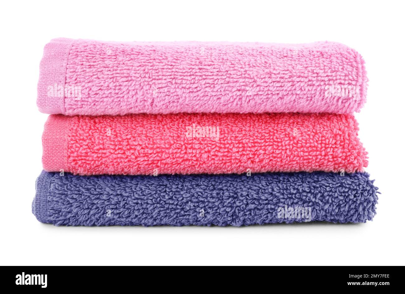 Folded soft terry towels isolated on white Stock Photo