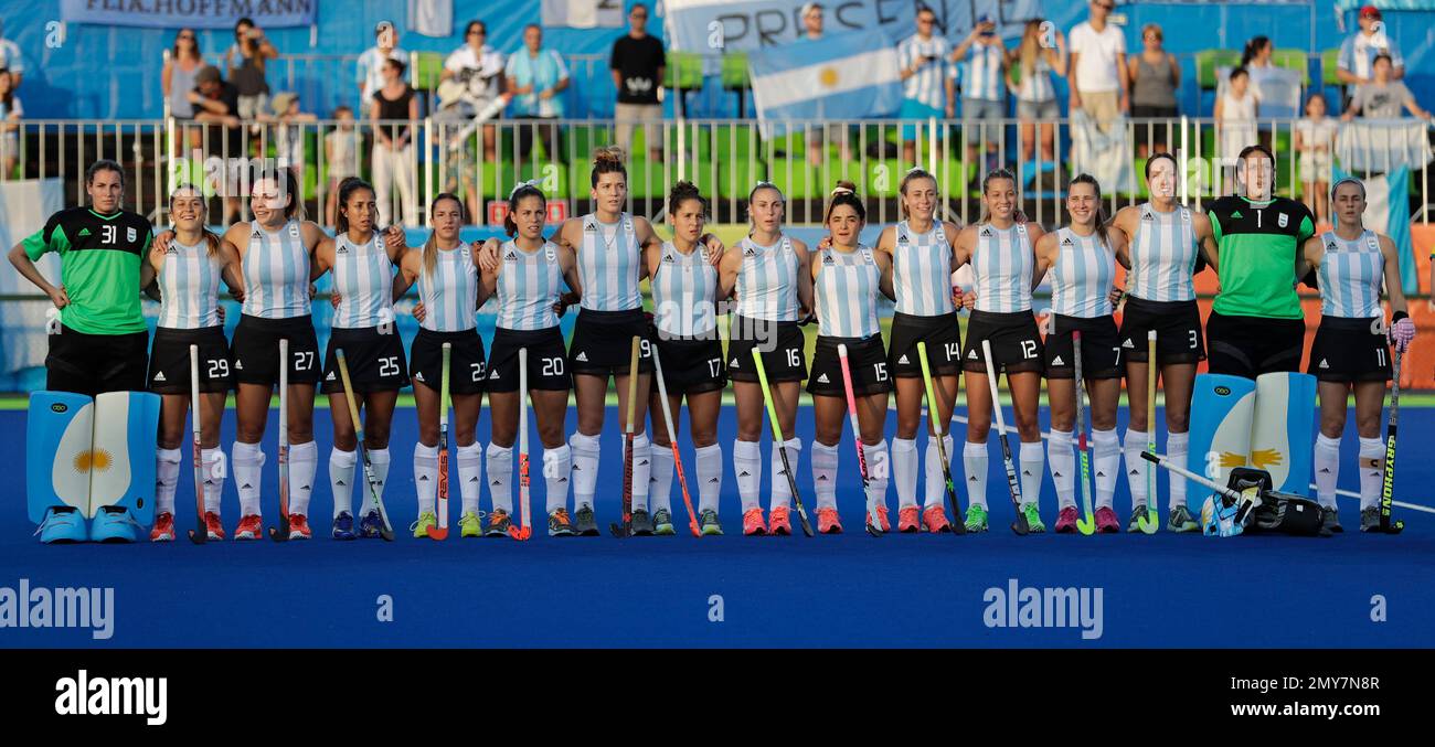 Argentina women field hockey team listen to their national anthem ...