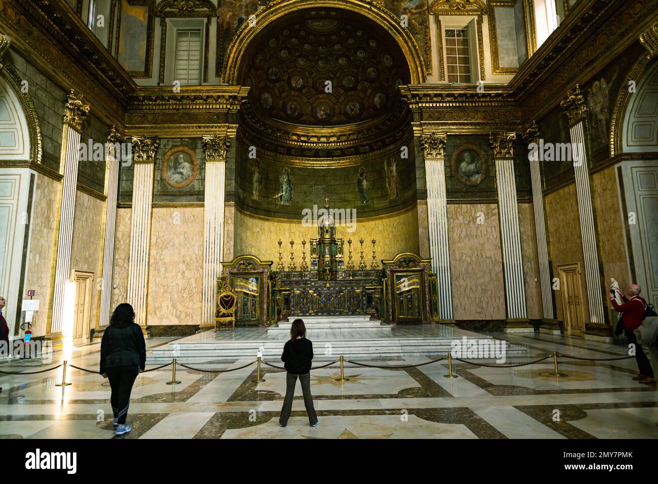 Royal Palace of Naples, tourits visit the chapel Stock Photo - Alamy