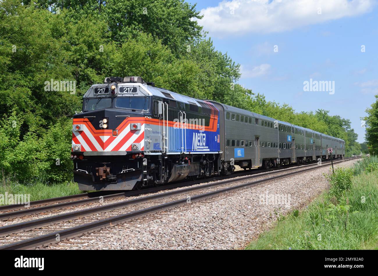 Bartlett, Illinois, USA. A Metra commuter train just prior to its arrival at the local commuter train staiton. Stock Photo