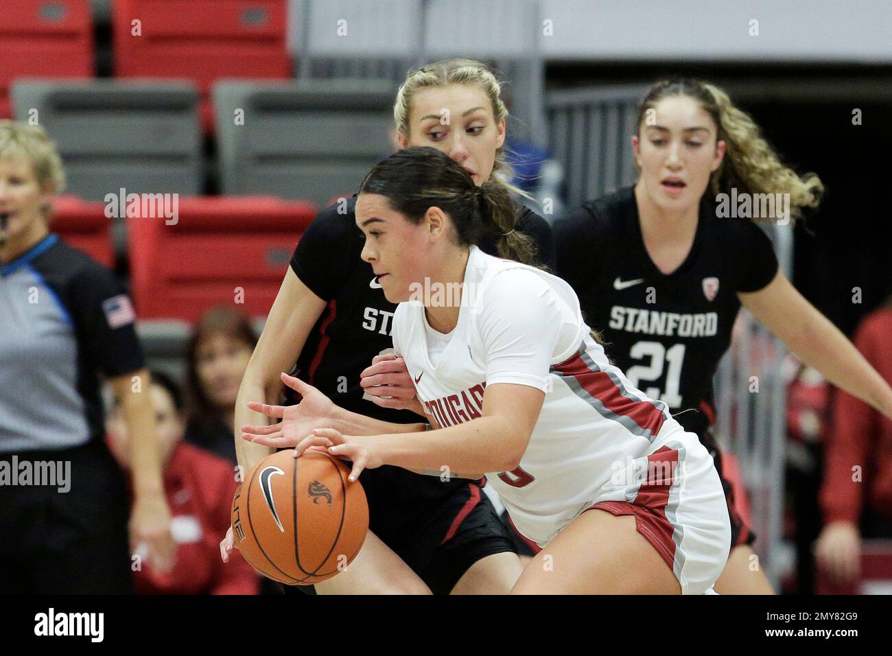 Washington State guard Charlisse LegerWalker, front, drives while