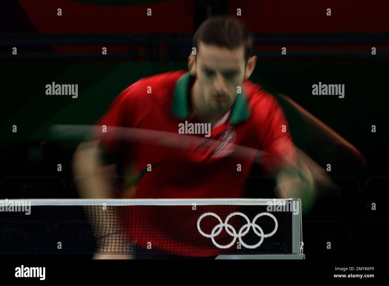 Portugal s Marcos Freitas throws a forehand during a table tennis