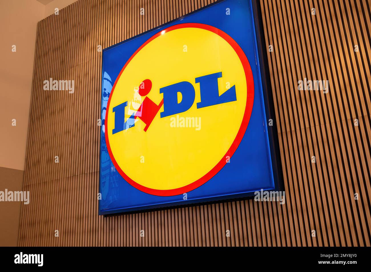 Lidl logo at supermarket building wall. German international discount supermarket retail chain. High quality photo Stock Photo