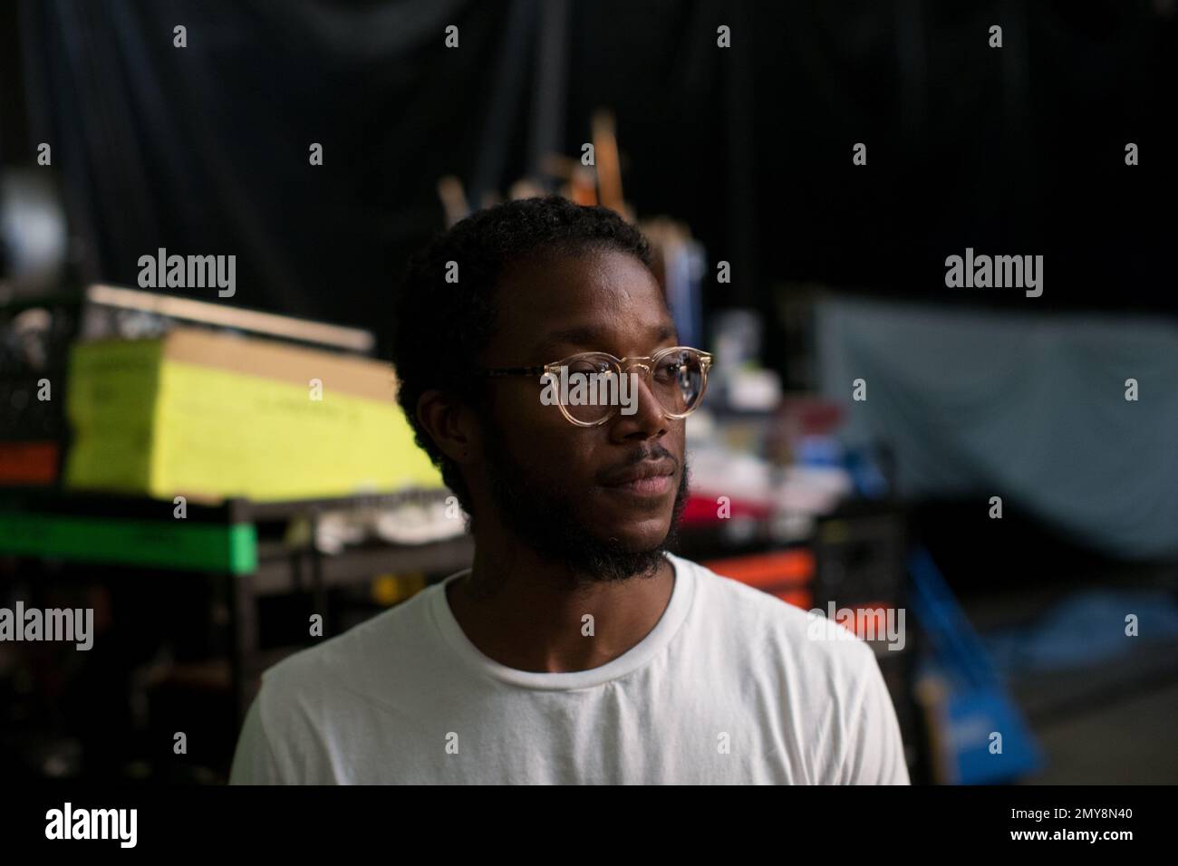 Choreographer Aakomon "AJ" Jones poses for a portrait on the set of