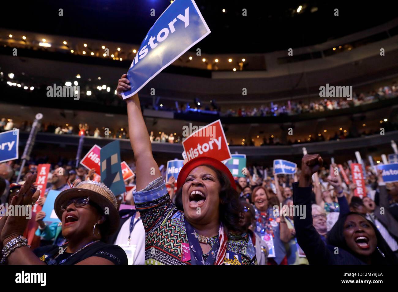 Delegates cheer as Democratic Presidential candidate Hillary Clinton ...