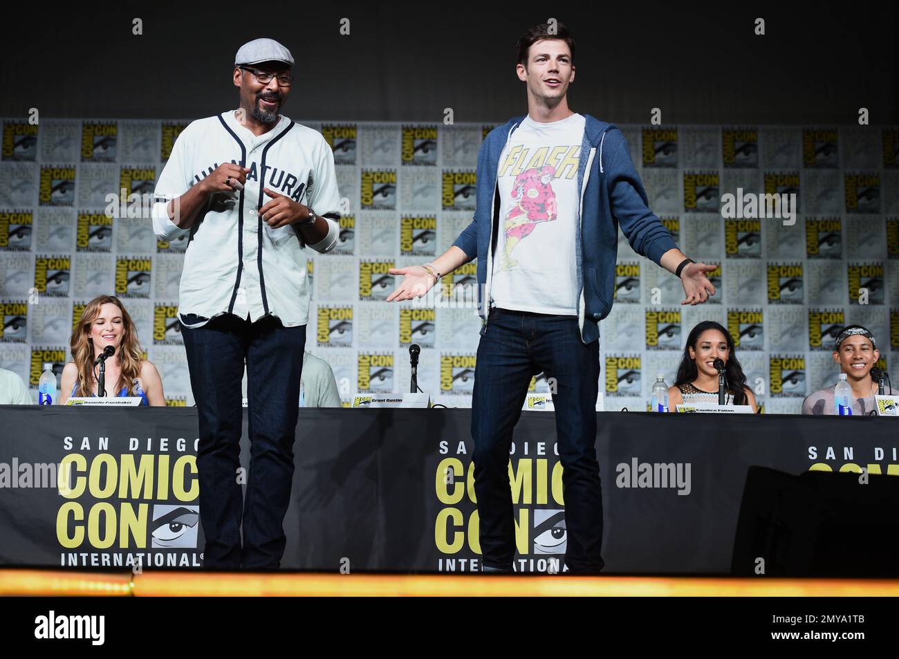 Jesse L. Martin, left, and Grant Gustin tap dance on stage at &ldquo;The 
