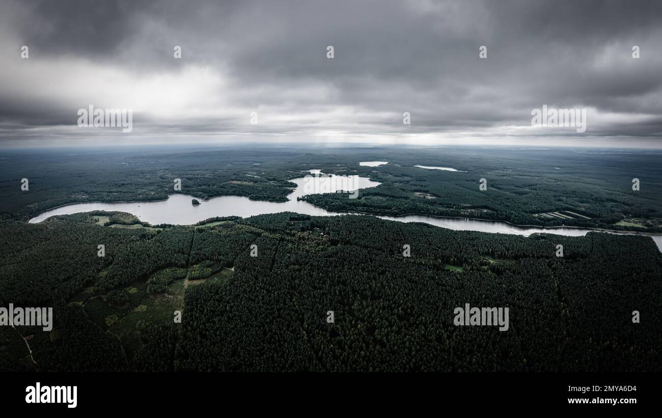 Moody sky before a storm over land of lakes Stock Photo