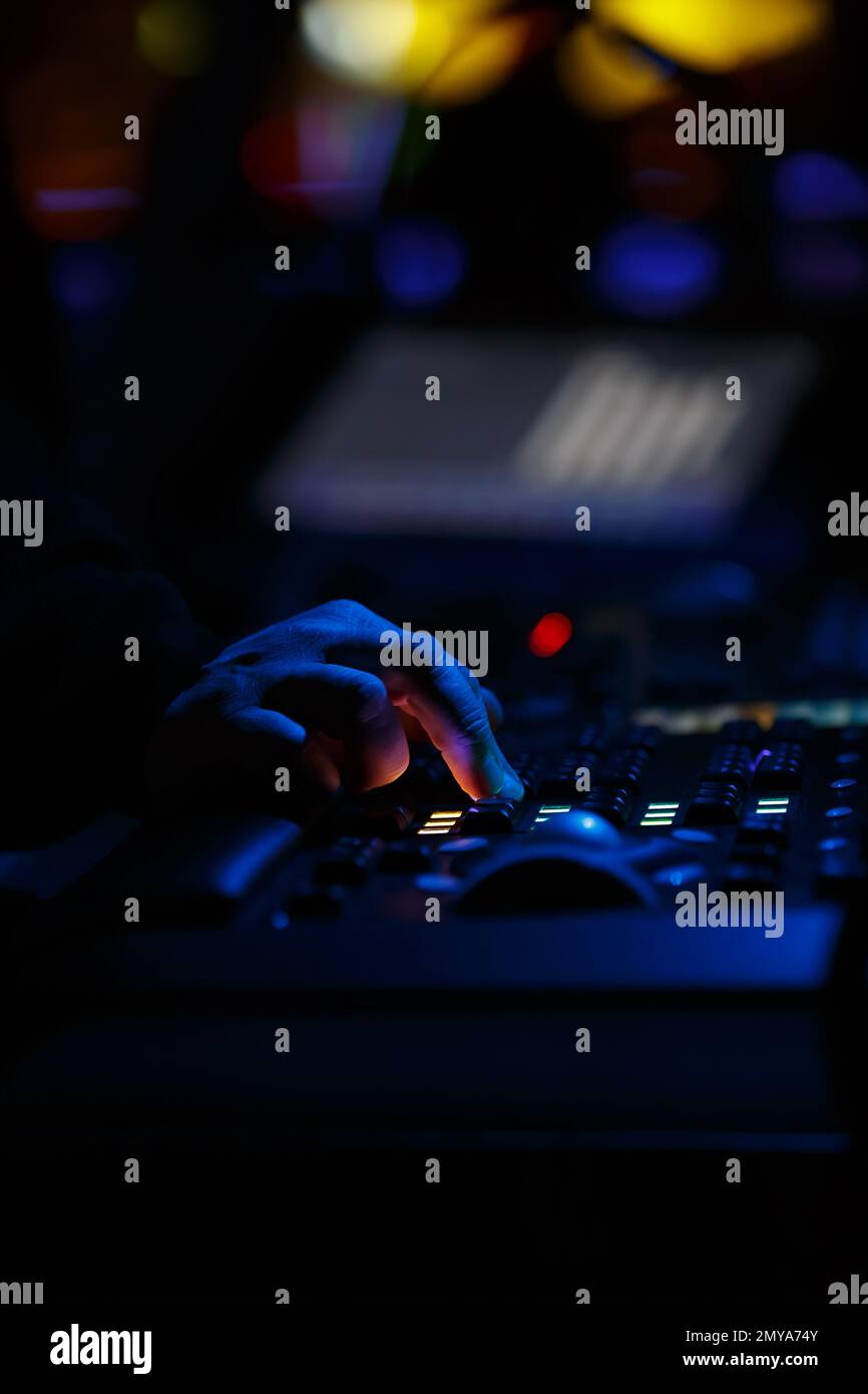 Stage lights engineer adjusting concert lighting on panel Stock Photo Alamy