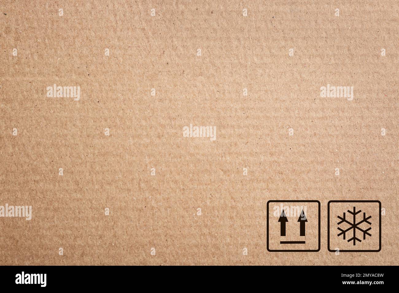 Cardboard box with packaging symbols as background, closeup Stock Photo ...