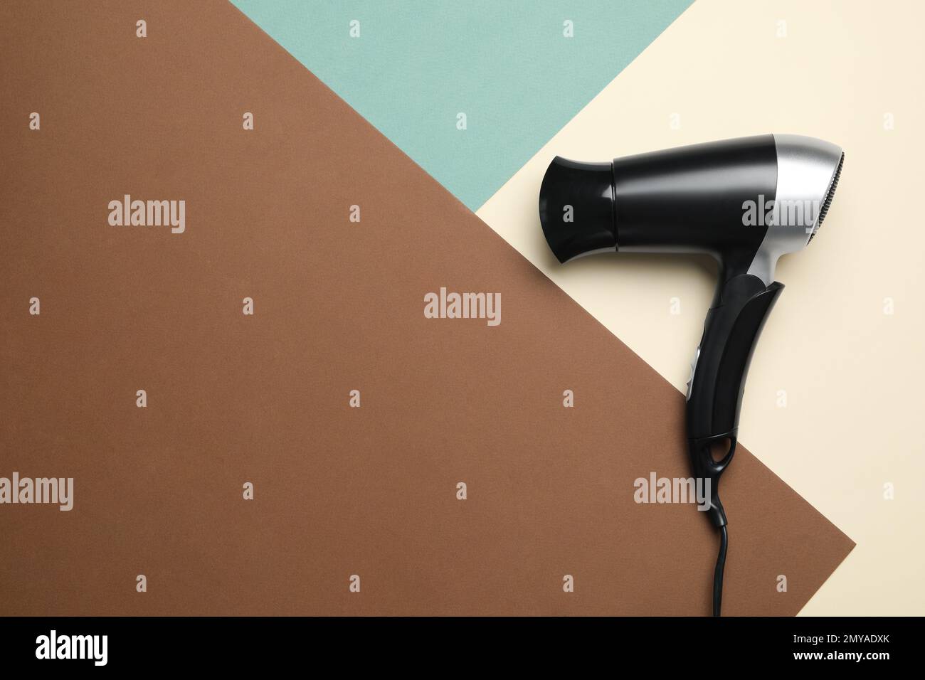 Hair dryer on color background, top view with space for text. Professional hairdresser tool Stock Photo - Alamy Hair dryer on color background, top view with space for text. Professional hairdresser tool Stock Photo - Alamy
