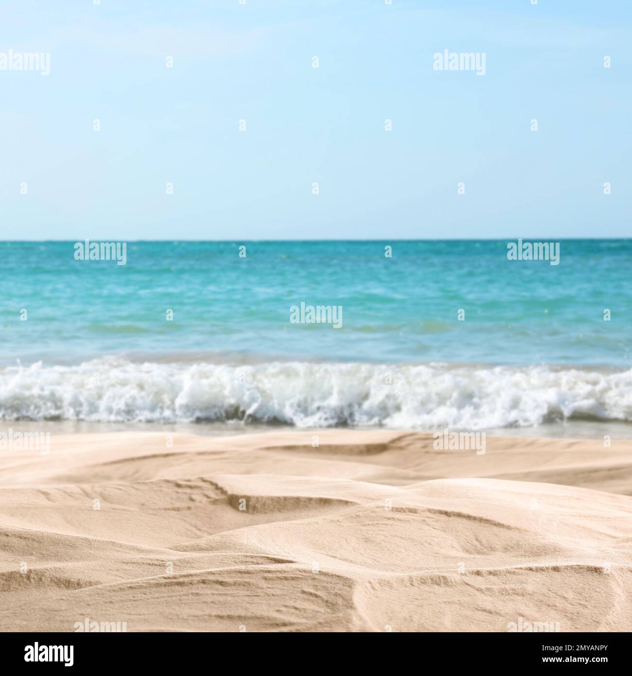Waves rolling on sandy beach hi-res stock photography and images - Alamy