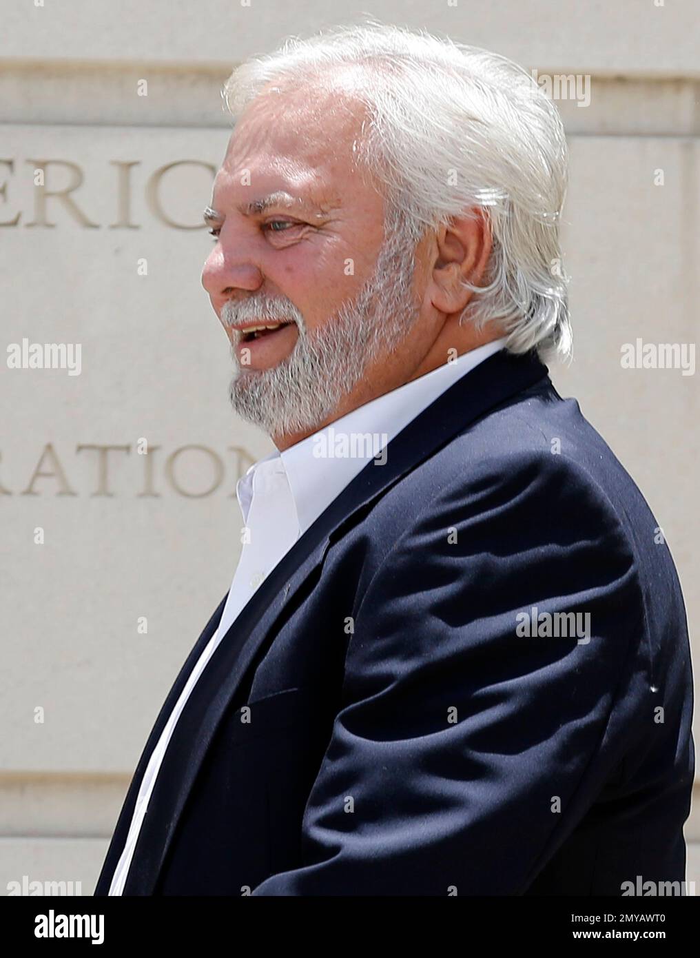 Cecil McCrory, a Brandon businessman, walks away from the federal