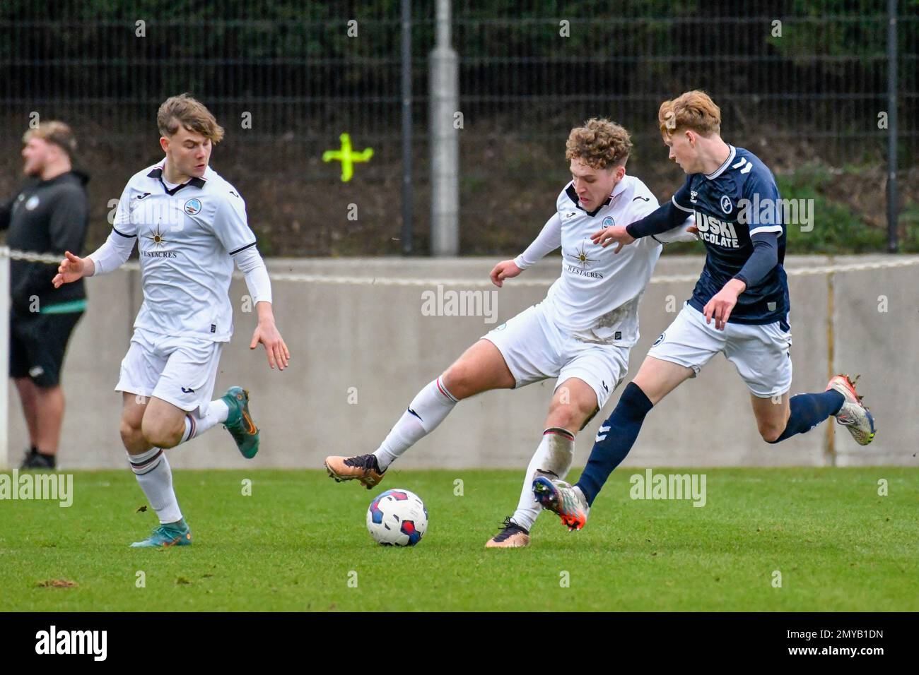 Swansea, Wales. 4 February 2023. Iwan Morgan of Swansea City high fives  Aimar Govea of Swansea City during the Professional Development League game  between Swansea City Under 18 and Millwall Under 18