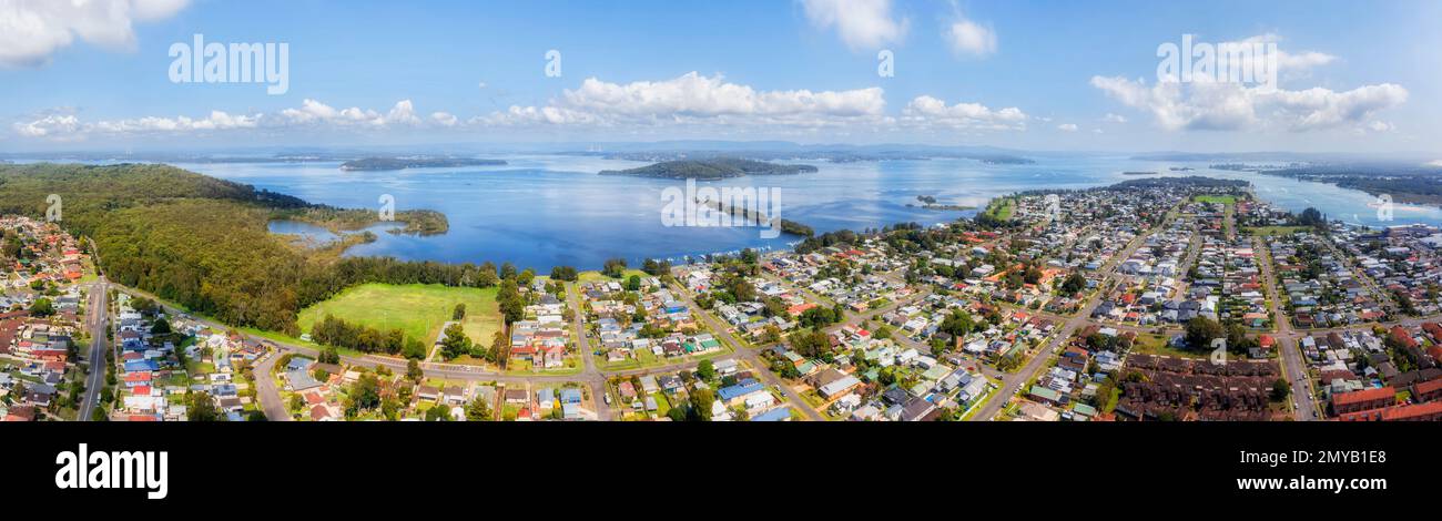 Scenic aerial panorama of lakeshore at Swansea coastal town on Lake Macquarie waterfront of Australia. Stock Photo