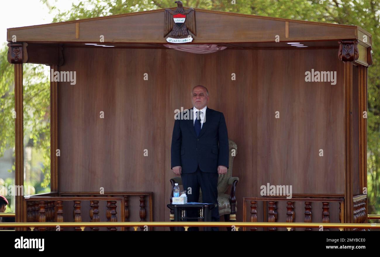 Iraqi Prime Minister Haider al-Abadi attends a parade in Baghdad, Iraq ...
