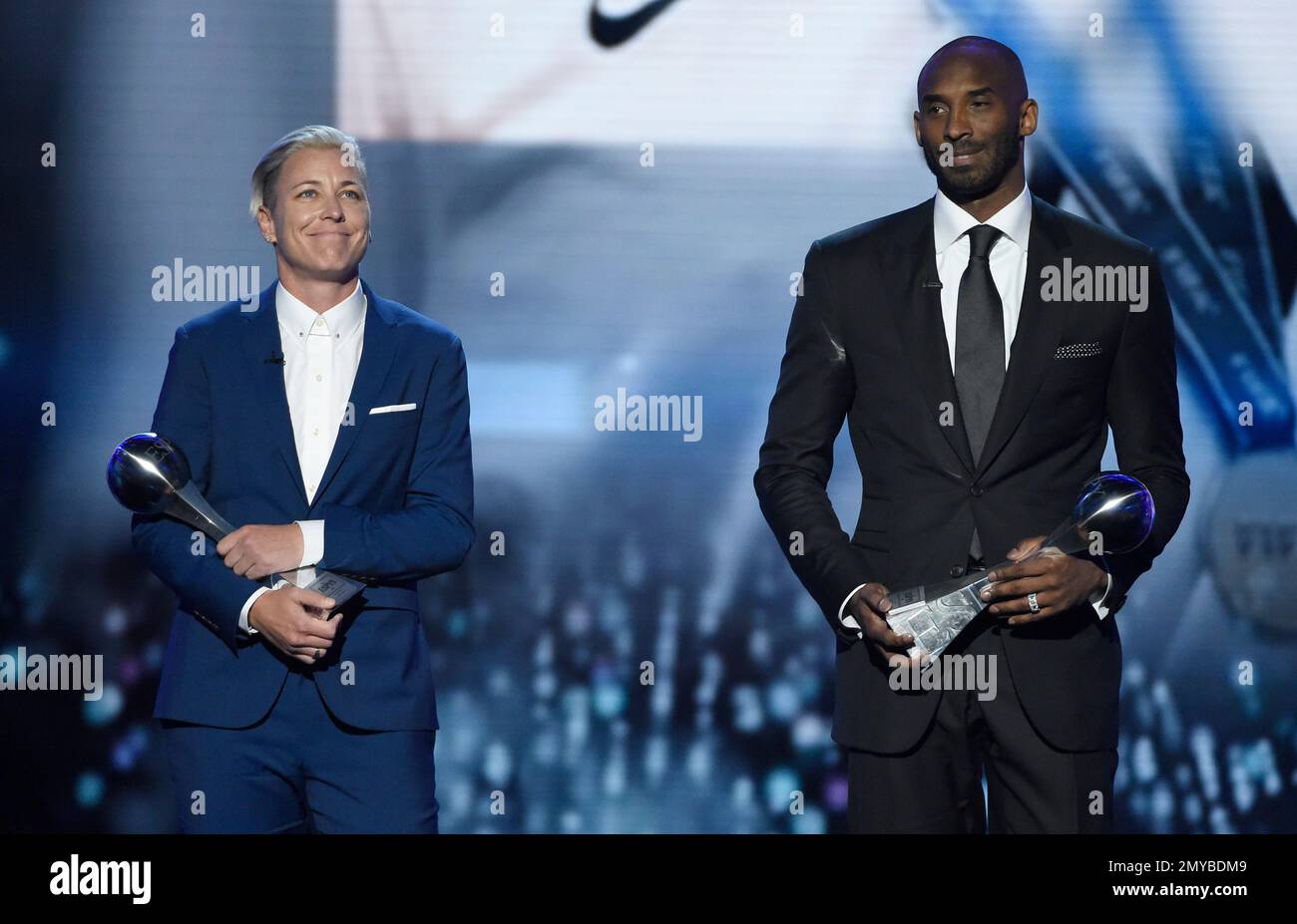 Former soccer player Abby Wambach, left, and former NBA basketball