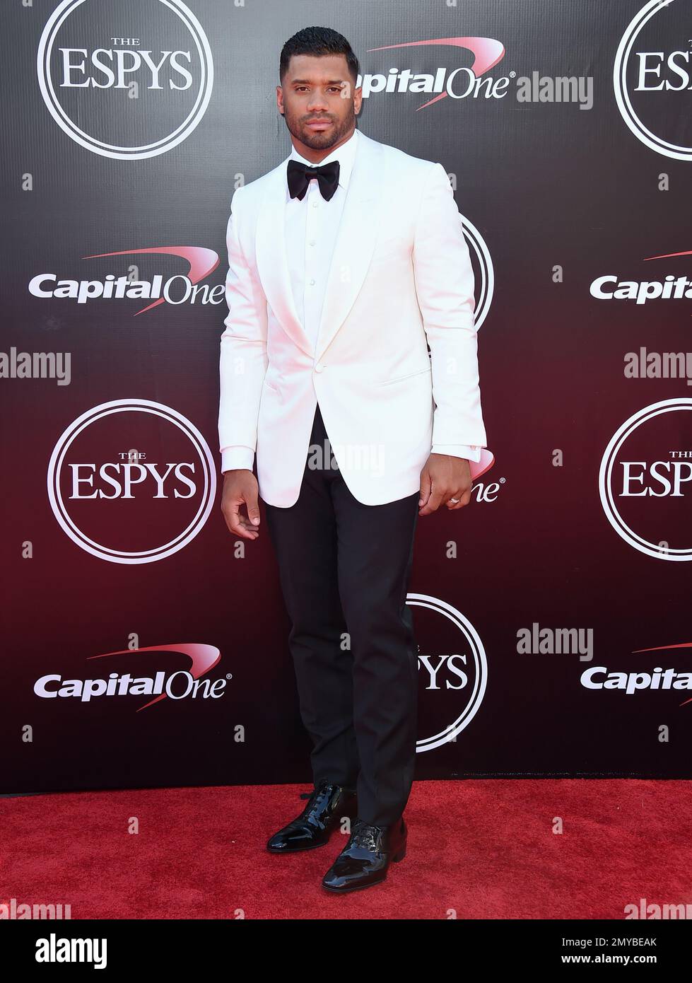 NFL football player Russell Wilson, of the Seattle Seahawks, arrives at