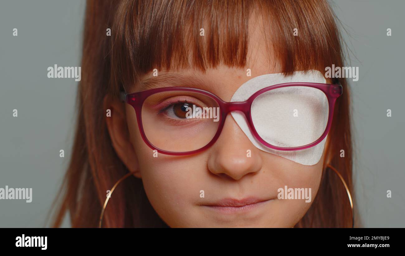 Closeup portrait sick ill preteen girl having protective bandage