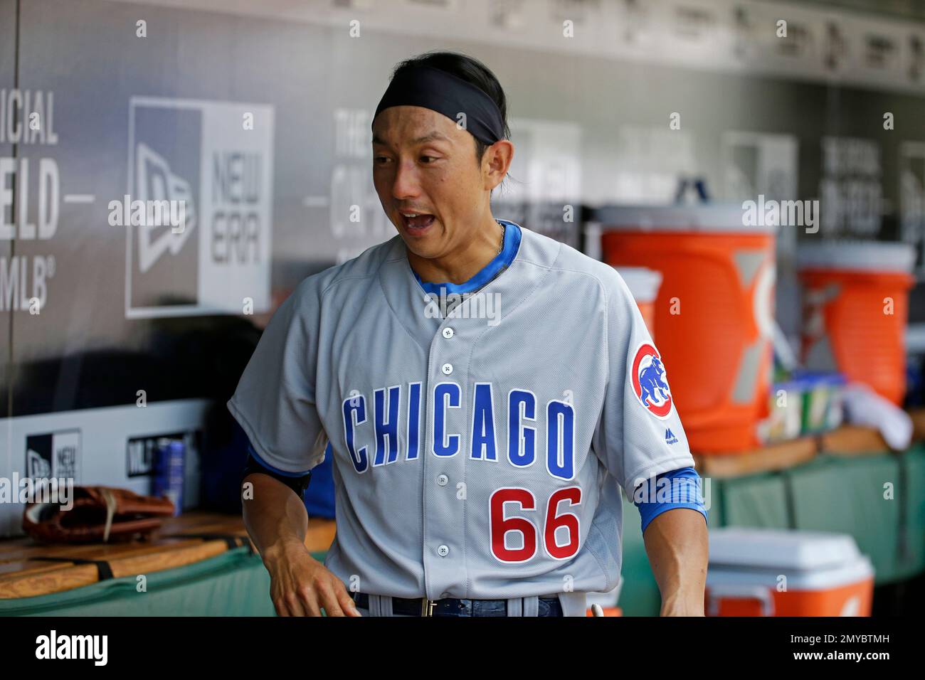 Chicago Cubs' Munenori Kawasaki walks in the dugout during a baseball game  against the Pittsburgh Pirates in Pittsburgh, Sunday, July 10, 2016.  Kawasaki did not play in the game and the Cubs