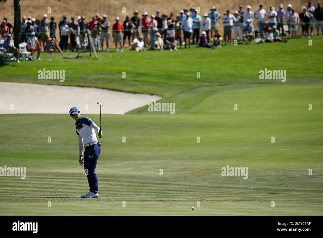 Sung Hyun Park, of South Korea, reacts after missing a birdie putt on ...