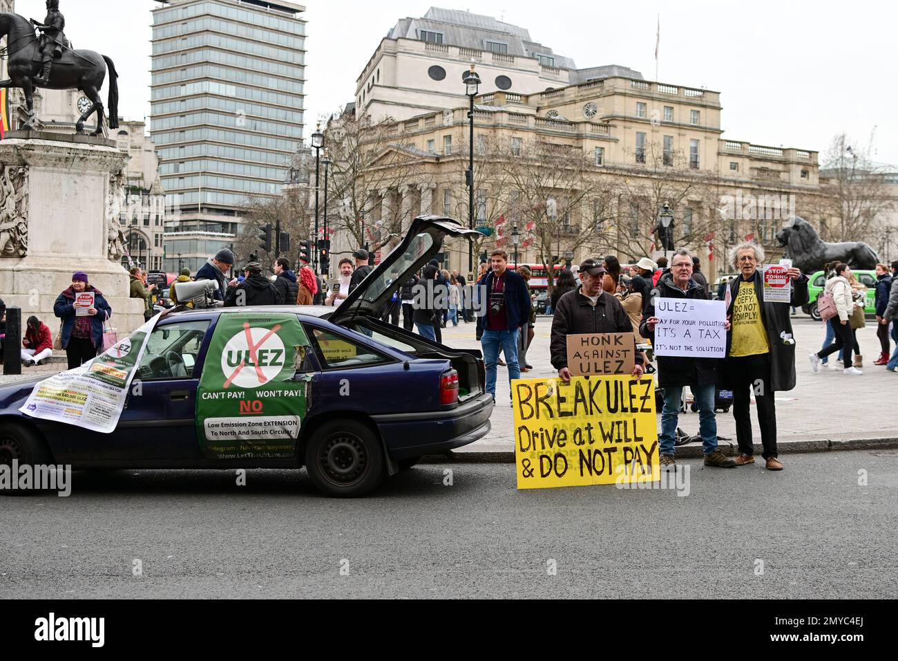 Trafalgar square, London, UK,  4 February 2023: The Piers Corbyn says he has been fine over £40,000 of ULEZ and he isn't going to pay the fine protest against The ULEZ Scandal with a car stop in the side of Trafalgar roundabout. Credit: See Li/Picture Capital/Alamy Live News Stock Photo