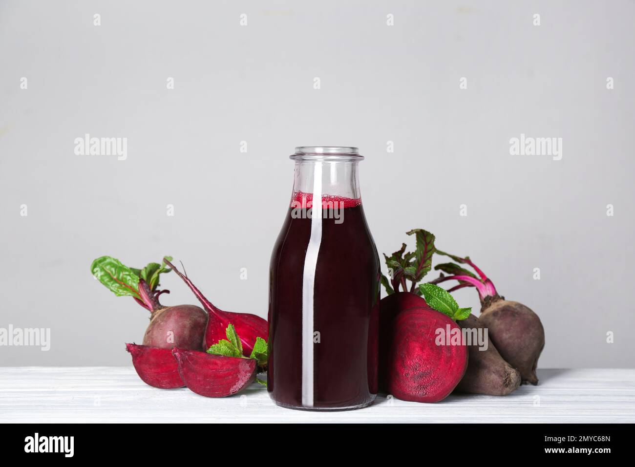 Freshly made beet juice on grey table Stock Photo